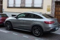 Profile view of grey mercedes suv car parked in the street Royalty Free Stock Photo