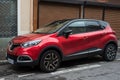 Profile view of red Renault captur parked in the street Royalty Free Stock Photo