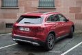 rear view of red mercedes SUV car parked in the street Royalty Free Stock Photo
