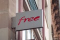 Closeup of free logo on store front in the street, free is the famous french phone operator