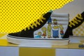 Summer sneakers printed with the famous character of the simpsons series Royalty Free Stock Photo