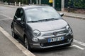 front view of grey Fiat 500 parked inn the street