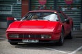 Front view of red ferrari 308 GTS parked in the street Royalty Free Stock Photo