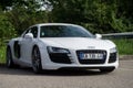 Front view of white Audi R8 coupe car parked in the street Royalty Free Stock Photo