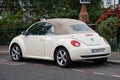 Rear view of beige Volkswagen new beetle parked in the street Royalty Free Stock Photo