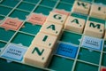 Closeup of plastic letters with word gain on Scrabble board game Royalty Free Stock Photo