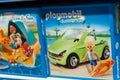 Playmobil toys in a blue box packaging a toys store