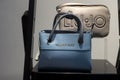 Closeup of blue leather handbag by Valentino in a luxury fashion store showroom Royalty Free Stock Photo