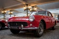 front view of red retro ferrari car parked in a showroom Royalty Free Stock Photo