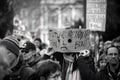 people protesting in the street with placard in french : futur retraite tiens bon, in