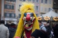 Portrait of masked people parading in the street