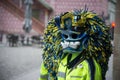 Portrait of masked people standing in the street