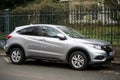 Profile view of grey Honda SRV the famous japanese suv car parked in the street