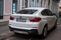 rear view of BMW X4 parked in the street