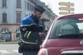 Portrait of policeman controlling alcohol on drivers in the street