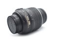 Optical zoom 18-55mm by Nikon on white background