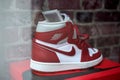 Closeup of red air jordan nike sneakers in a fashion store showroom