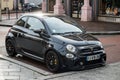 Front view of black Fiat 500 Abarth parked in the street