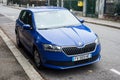 Front view of blue Skoda Fabia parked in the street