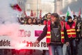 Portrait of people protesting with smoke against the government reforms