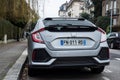 Rear view of grey Honda Civic car parked in the street