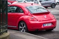 Rear view of red Volkswagen new beetle Parked in the street Royalty Free Stock Photo