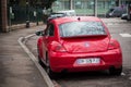 Rear view of red Volkswagen new beetle Parked in the street Royalty Free Stock Photo