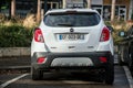 Rear view of white Opel SUV parked in the street, Opel is a famous german brand of cars