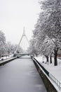 trees silhouettes and bridge covered by the snow in border frozen river Royalty Free Stock Photo