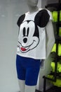 White tee shirt printed mickey mouse by Walt Disney in a fashion store showroom