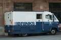 Brinks truck parked in front of train station Royalty Free Stock Photo