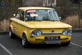 Front view of yellow NSU vintage car parked in the street Royalty Free Stock Photo