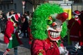 Masked people parading in the street