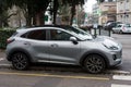Profile view of grey Ford Puma SUV parked in the street