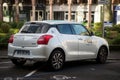 Rear view of city sharing car parked in the street