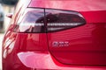 Rear view of red Volkswagen Golf GTI parked in the street Royalty Free Stock Photo