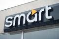 Smart logo sign in showroom front - Smart is the mini concept car brand of electric