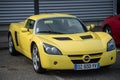 Front view of yellow Opel Speedster roadster of parked in the street