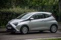 Front view of grey toyota Yaris parked in the street