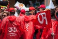 people from public service protesting with flags against the lower wages and new reforms from the government with red flags Royalty Free Stock Photo