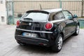 Rear view of black Alfa Romeo Mito car parked in the street Royalty Free Stock Photo