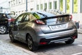 Rear view of new grey Honda Civic parked in the street