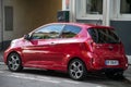 Rear view of red KIA Picanto sport parked in the street Royalty Free Stock Photo