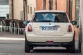 White austin cooper parked in the street