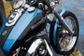 Blue and black tank on Harley Davidson motorbike parked in the street Royalty Free Stock Photo