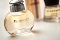 Burberry perfume in a miniature bottles on white background