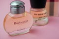 Burberry from London perfume in a transparent bottles on pink background