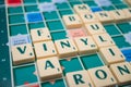 Plastic letters to forming crosswords on Scrabble board game Royalty Free Stock Photo