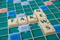 Scrabble letters forming the word `Fake News` on the game board