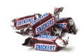 Snickers chocolate bar by Mars compagny in brown packaging on white background